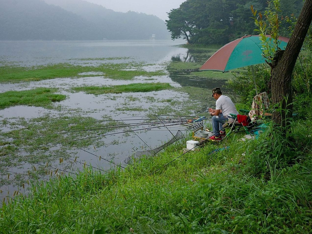 Pescador na água